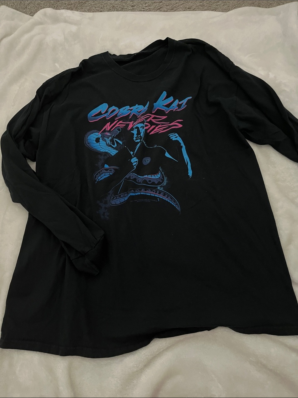 Cobra Kai Never Dies Graphic Long Sleeve Tee - Black with Blue & Pink Print